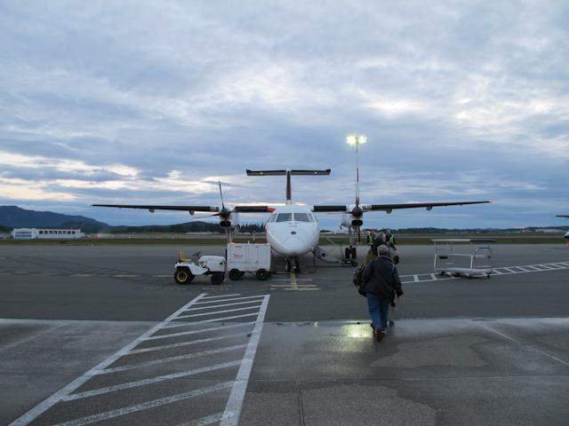 Is the sun setting on traditional, economy-class airfare? Some carriers, even regional ones like Air Canada Jazz, pictured here, still believe in service. Photo © 2011 Aaron Saunders