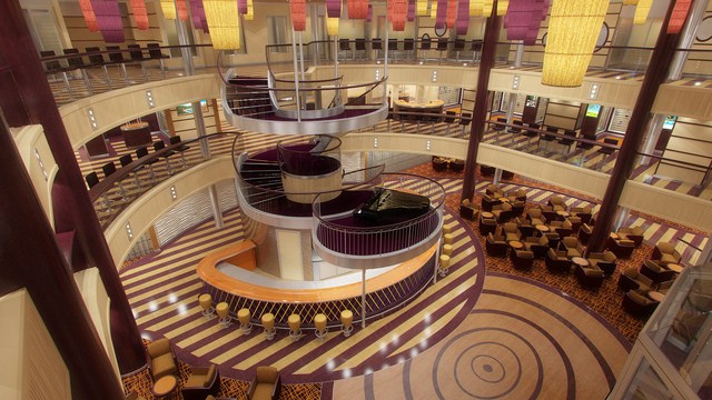 The spectacular Atrium aboard Carnival Breeze reflects the new color palette chosen for this innovative ship. Rendering courtesy of Carnival.