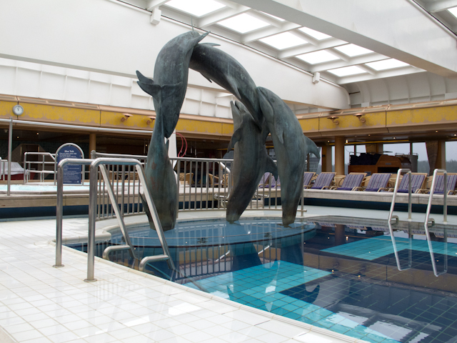 Each Holland America ship boasts its own unique design elements, like this playful sculpture that adorns the Lido Pool onboard the Volendam. Photo © 2012 Aaron Saunders