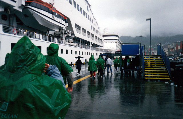Ketchikan, July 1998: I've never seen it rain so hard in my life. Note the green "Norwegian Cruise Line" ponchos, which were provided free of charge at the time. Photo © Aaron Saunders
