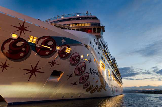 Norwegian Cruise Line's Norwegian Pearl, illuminated at dusk in Victoria, British Columbia. Photo © 2013 Aaron Saunders