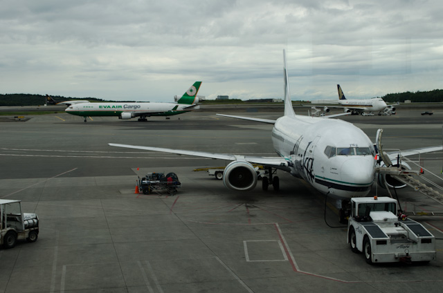 North, to Alaska: an Alaska Airlines Boeing 737-400 Combi is seen at the gate in Anchorage on my journey to Fairbanks. Photo © 2013 Aaron Saunders