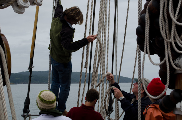 Passengers and crew alike help to raise Zodiac's sails; an absolute treat. Photo © 2013 Aaron Saunders