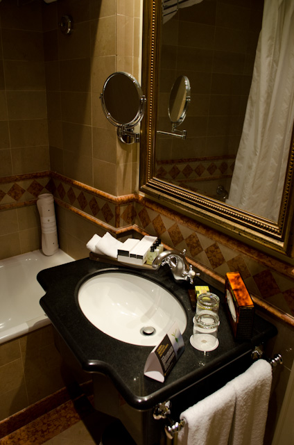 Bathrooms are a touch on the small side, but very well appointed. They also include complimentary toothbrush and shaving kits! Photo © 2013 Aaron Saunders