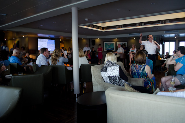 The staff and crew of the Wind Star greet guests in the Lounge during our Welcome Aboard presentation. Photo © 2013 Aaron Saunders
