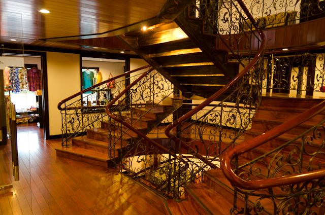 The Deck 2 central staircase landing aboard AmaLotus. Directly ahead is the ship's Gift Shop. Photo © 2013 Aaron Saunders
