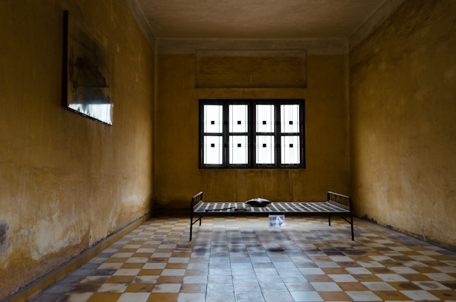 One of many rooms in S-21's "Building A." The photograph to the left is too graphic to show. Photo © 2013 Aaron Saunders
