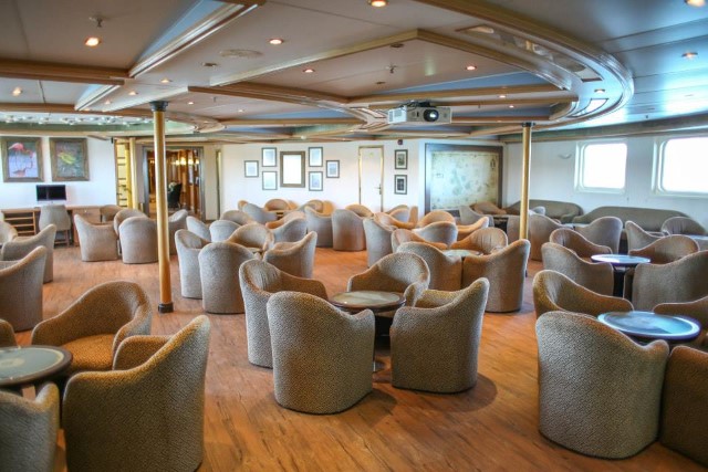 Silver Galapagos underwent a massive refit prior to entering service with Silversea. Pictured here is the ship's Main Lounge. Photo courtesy of Silversea.
