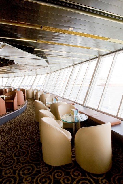 Located high atop the ship, the Stars Lounge wraps around the base of the funnel aboard Louis Cristal. Photo courtesy of Cuba Cruise