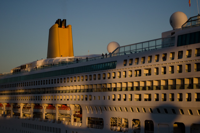 Aurora may not have any direct siblings, but she clearly borrows some of the same design elements as Princess Cruises' Sun Class, such as the bowed windows above her promenade deck and the structural 'cut-in' arrangement of her balcony staterooms. Photo © 2013 Aaron Saunders