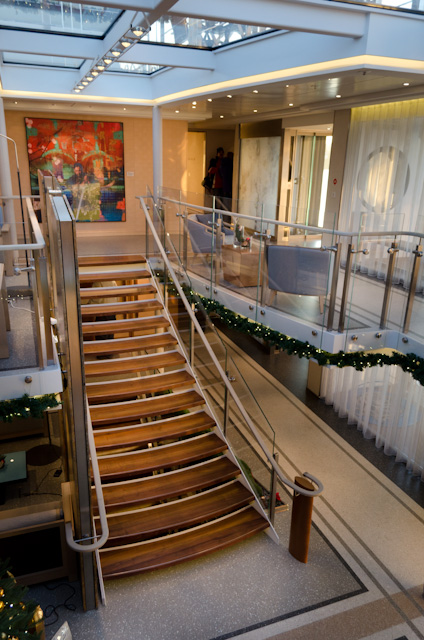 By the time Viking Baldur was launched in 2013, a number of changes had been made. Note the lack of a chandelier, and the change in the flooring on the upper story from carpet to tile. Lighting sources have also been modified. Photo © 2013 Aaron Saunders