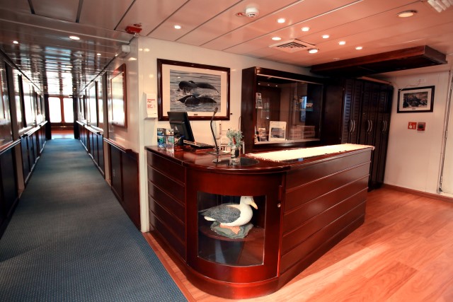 Safari Voyager underwent an extensive refurbishment prior to entering service with Un-Cruise in late 2013, and it shows in this photograph of the ship's Reception Area. Photo courtesy of Un-Cruise Adventures.