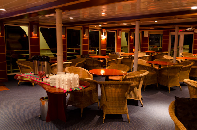 The attractive Lounge aboard Safari Voyager is the social hub of the ship. Photo © 2014 Aaron Saunders