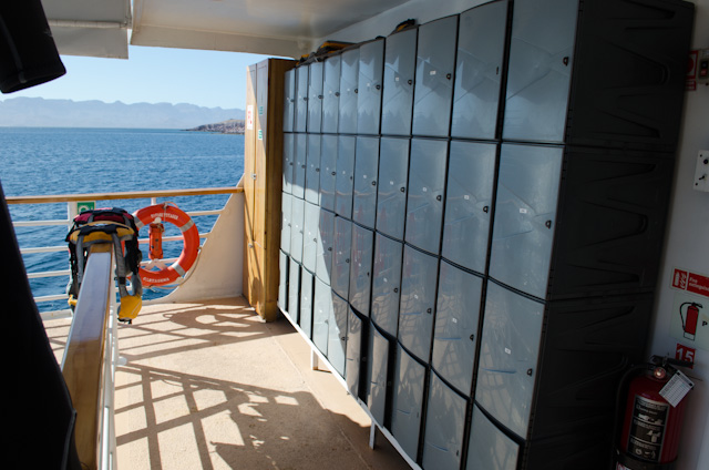 All the way aft on Deck 2 is a small storage area for wetsuits (not pictured), along with cabin-specific numbered lockers for lifejackets and snorkel gear. Photo © 2014 Aaron Saunders