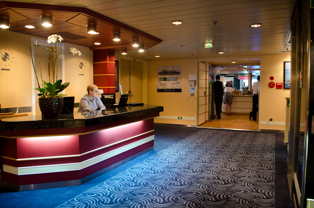 Silver Discoverer's Reception Lobby, with the Explorer Lounge in the background. Photo © 2014 Aaron Saunders