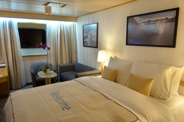 View Suites, on Decks 4 and 5, are identical to their Explorer Suite counterparts, with the exception of a picture window in place of the porthole windows. Photo © 2014 Aaron Saunders