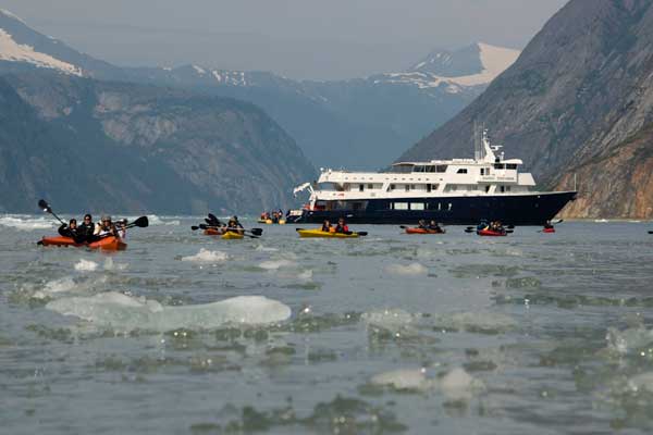 Guests in Alaska can enjoy beachcombing, hiking, or even kayaking with Un-Cruise. Photo courtesy of Un-Cruise Adventures.