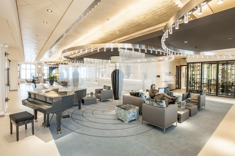 EUROPA 2's interiors are elegant and modern. Shown here is the Reception Lobby on Deck 4. Photo courtesy of Hapag-Lloyd Cruises