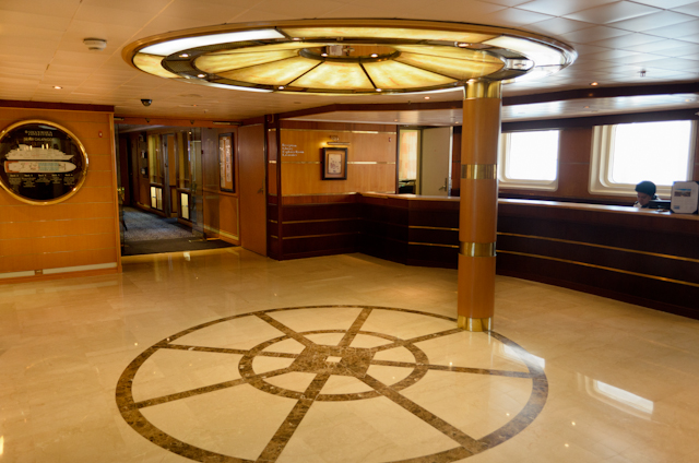 The welcoming Reception Area aboard Silversea's Silver Galapagos, facing port / aft. Photo © 2014 Aaron Saunders