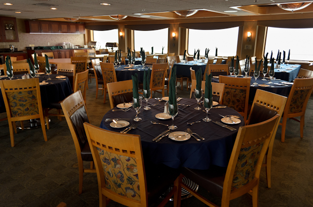 Safari Endeavour's inviting dining room features plenty of different seating options that encourage guests to mingle. Photo © 2014 Aaron Saunders