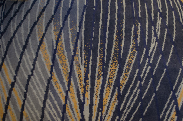 Viking Hemming carpet details. Hues of blue and yellow are used more aboard these ships, to great effect. Photo © 2014 Aaron Saunders