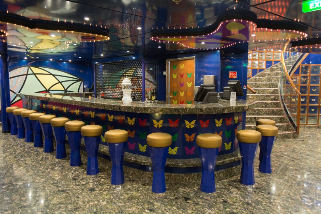 The main bar at the Butterflies Lounge, seriously channeling the Carnival of the 1990's. Love it! Photo © 2016 Aaron Saunders