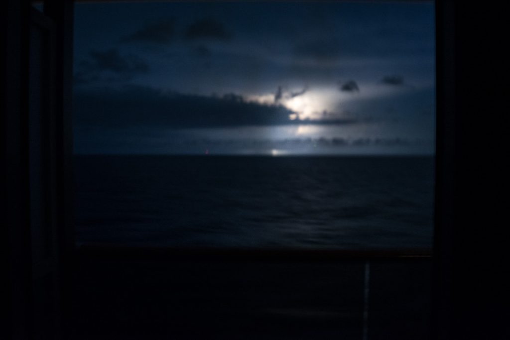 The Best I Can Do: an out-of-focus shot of some sheet lightning that absolutely lit up the sky just after five o'clock this morning as Carnival Pride sails north on the Atlantic to Baltimore. Photo © 2016 Aaron Saunders