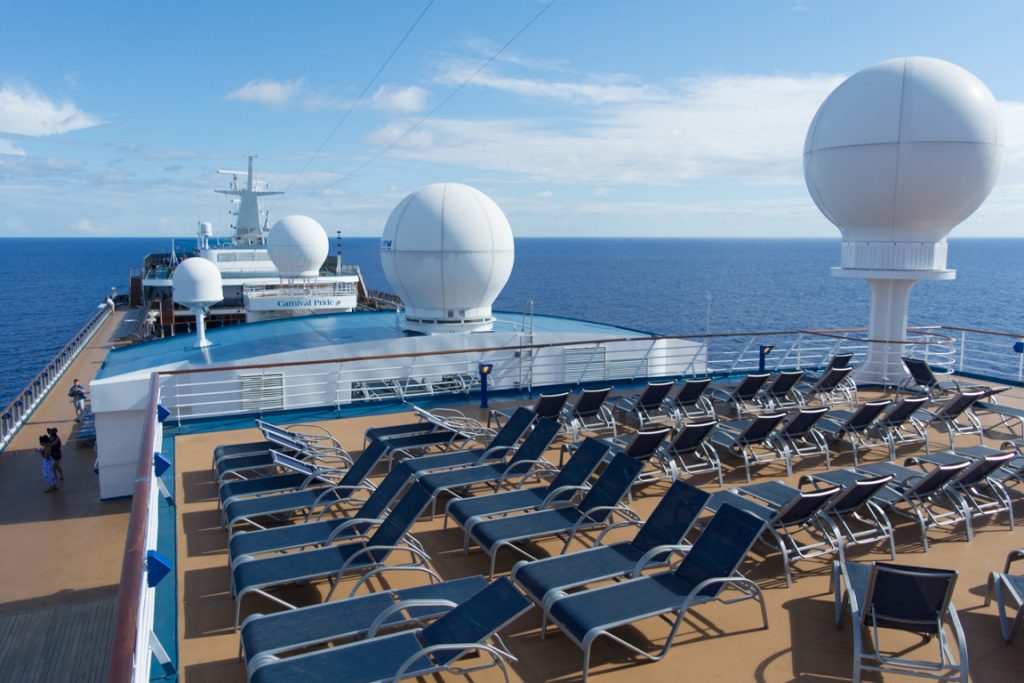 For those who think getting a deck chair is impossible on a Carnival ship: not true! Hardly anyone finds this seating area up on Deck 11, forward of the ship's funnel. Photo © 2016 Aaron Saunders