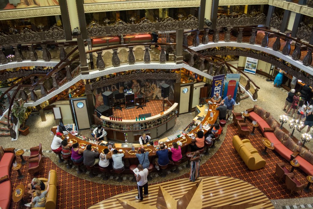 Welcome aboard Carnival Pride! The always-popular Atrium Bar, as seen from the Deck 4 elevator landing. Photo © 2016 Aaron Saunders