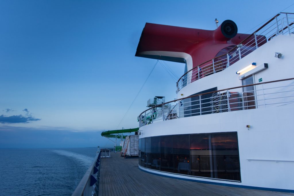 Carnival Pride eases her way out into the Atlantic Ocean on the evening of August 14, 2016. Photo © 2016 Aaron Saunders