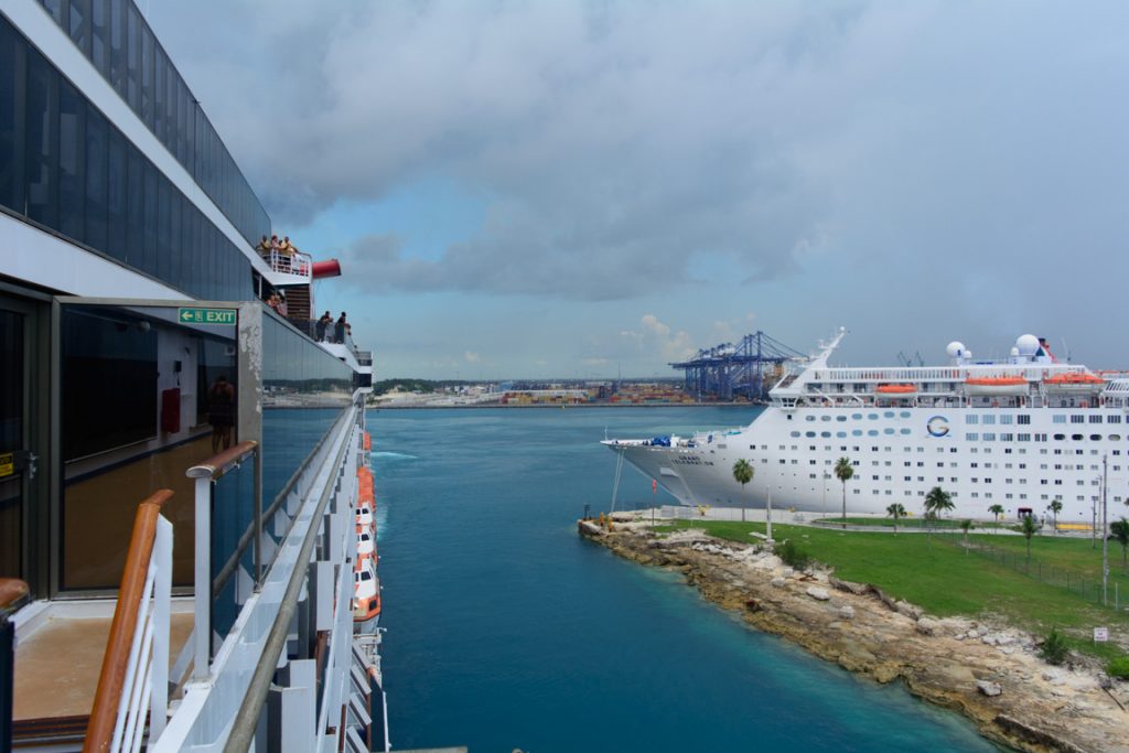 The newer Carnival Pride leaves her current and former fleetmates behind as we head out of Freeport in advance of a nasty-looking storm. Photo © 2016 Aaron Saunders