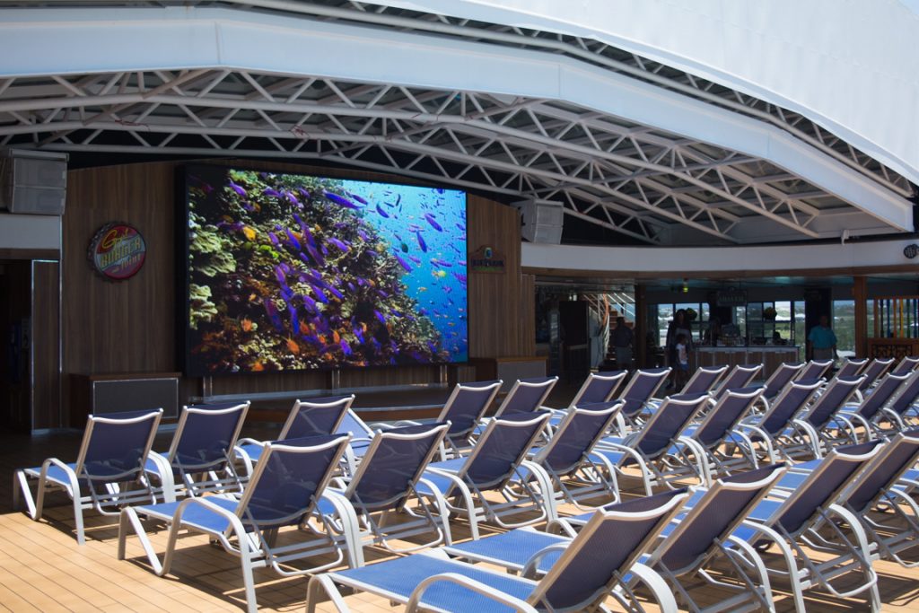 Catch a movie under the stars at the Seaside Theatre. Today, three selections - including a special midnight screening - are being held on Lido Deck 9. Photo © 2016 Aaron Saunders